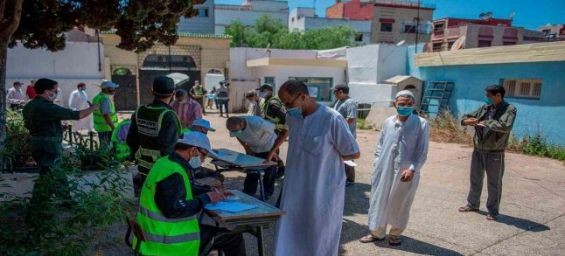 Health workers receive their first doses of the vaccine as campaign kick starts in Morocco