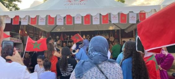 Olympic flame visits Moroccan stand at Paris fan zone