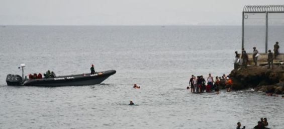 Dozens of migrants swim from Morocco to Ceuta in dense fog