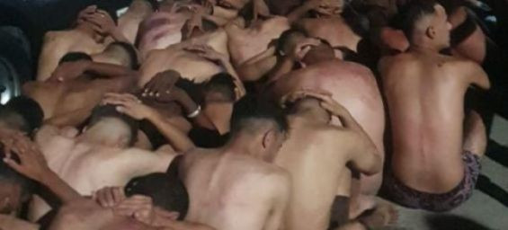 Viral photos of topless migrants : Investigation launched