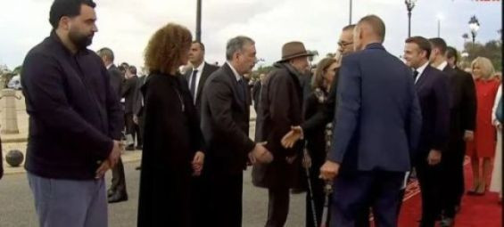 French-Moroccan comedian's casual outfit while greeting Moroccan King sparks controversy 