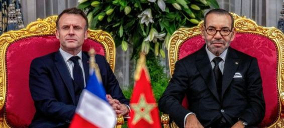 King Mohammed VI and French President Emmanuel Macron attend a signing ceremony - AFP/Ammar Abd Rabbo
