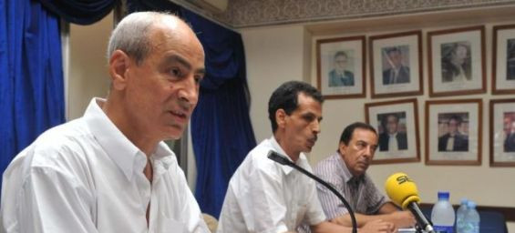 Fouad Abdelmoumni (left) and other Members of the Parliamentary Monarchy Now in Morocco coalition give a press conference on June 28, 2011 in Rabat.  © 2011 Abdelhak Senna/AFP via Getty Images