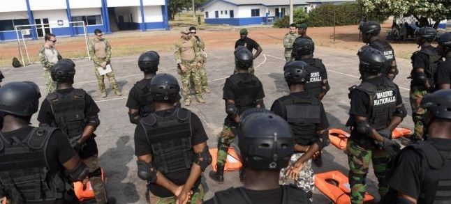 Turkish Navy Special Forces assigned to the martime security centre of excellence mobile training team introduce themselves to Ivorian Sailors at the Ivorian Naval Base March 20, 2017. Ph/ US Navy