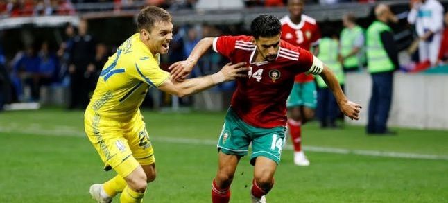 Morocco's M'barek Boussoufa in action with Ukraine's Oleksandr Karavayev./Ph. DR
