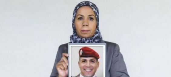 French-Moroccan activist Latifa Ibn Ziaten holding the photo of her son Imad who was murdered by Mohamed Merah in 2012. / Ph. DR
