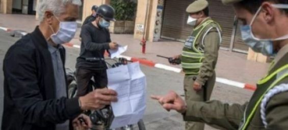 Local authorities checking a citizen's permit amid lockdown on April 9 in Rabat . / Ph. Fadel Senna- AFP