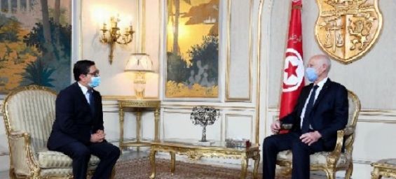 Foreign Affairs Minister Nasser Bourita and Tunisian President Kais Saeid. / DR