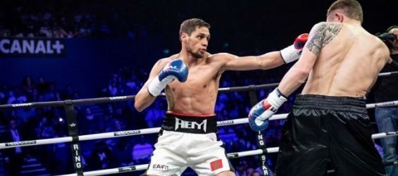 Moroccan French boxer Ahmed EL Mousaoui punching his Russia rival Alexey Evchenko on Saturday 23rd of June, 2018, in Paris./Ph. Ringstar