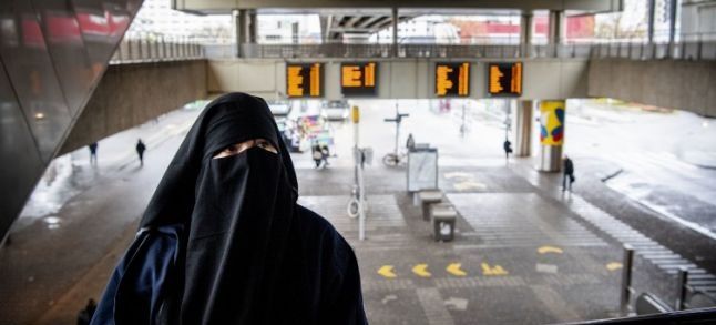 A woman with a burqa. / Ph. DR