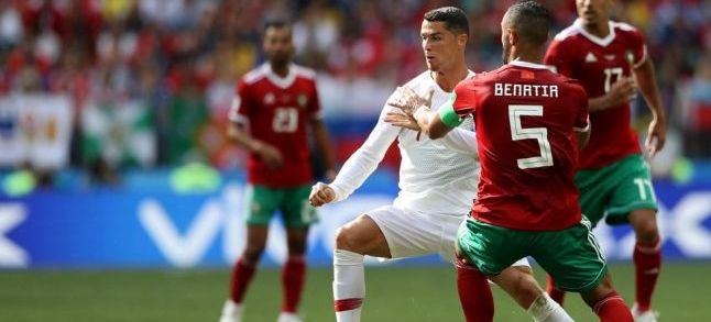 Cristiano Ronaldo and Mehdi Benatia during the Portugal-Morocco game at the world cup