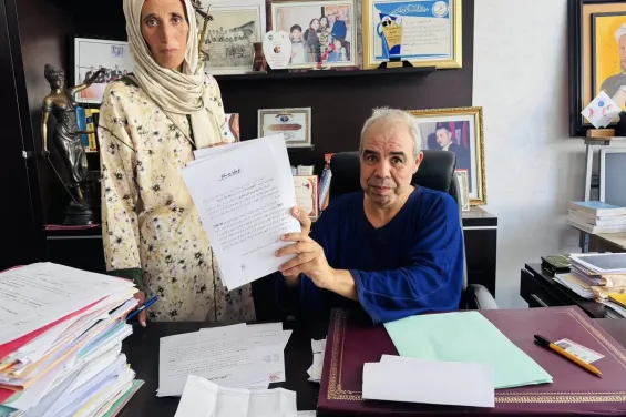 The mother of the late child alongside lawyer Sabri El Hou.