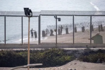 Migrants from sub-Saharan Africa enter Ceuta amid adverse weather conditions